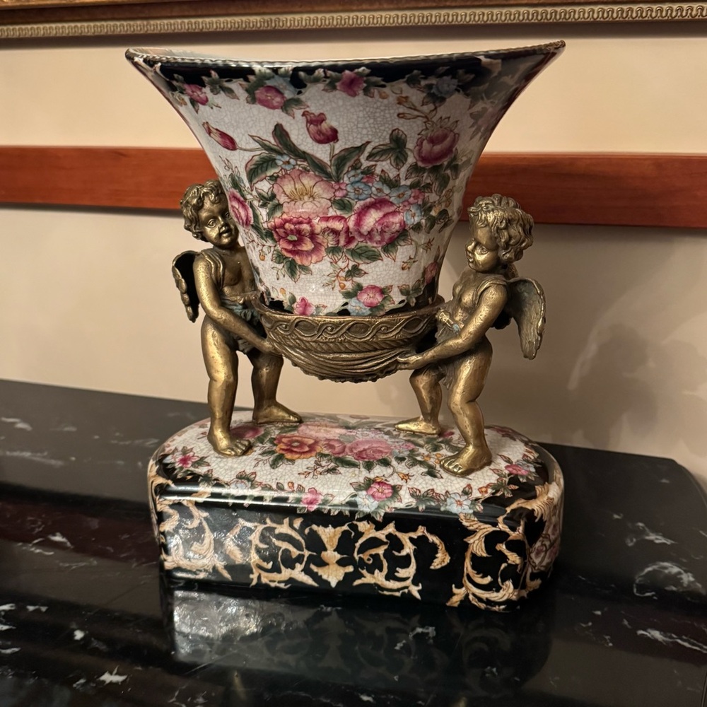 Wong Lee Chinese floral Cherub porcelain Vase with bronze Accents.
